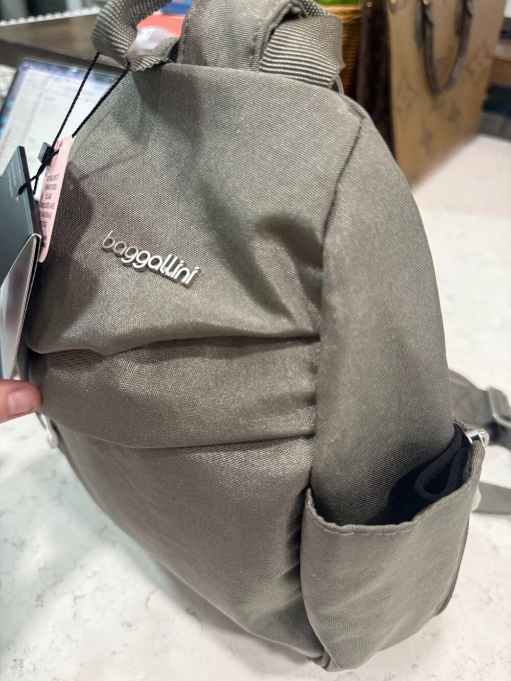Baggallini Medium Sling Backpack - 9"x11" Lightweight Sling Bag with Convertible - Picture 5 of 11